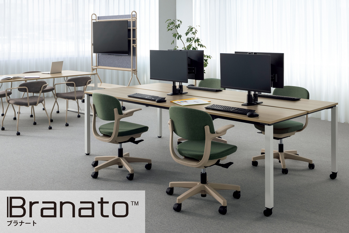 スタンダードデスク＆テーブル＜ブラナート＞のイメージ画像。手前には「ワークテーブル 両面タイプ」に4脚のオフィスチェアー、奥には「ミーティング用テーブル」とミーティング用チェアーが4脚設置されている。